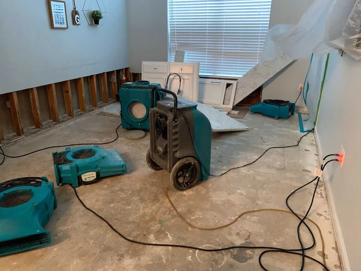 Dehumidifier in flood-cut room for Water Damage Restoration in East Hills